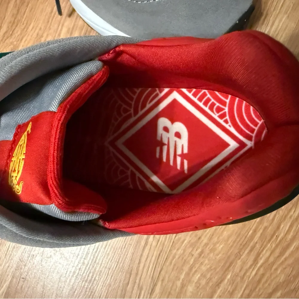 New Balance Gray Sneakers with Red, Green, and Yellow Accents - Picture 2 of 5